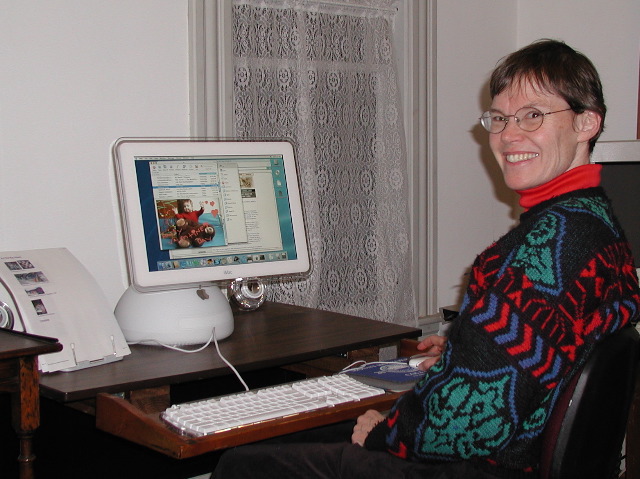 photo of Sandy at her computer